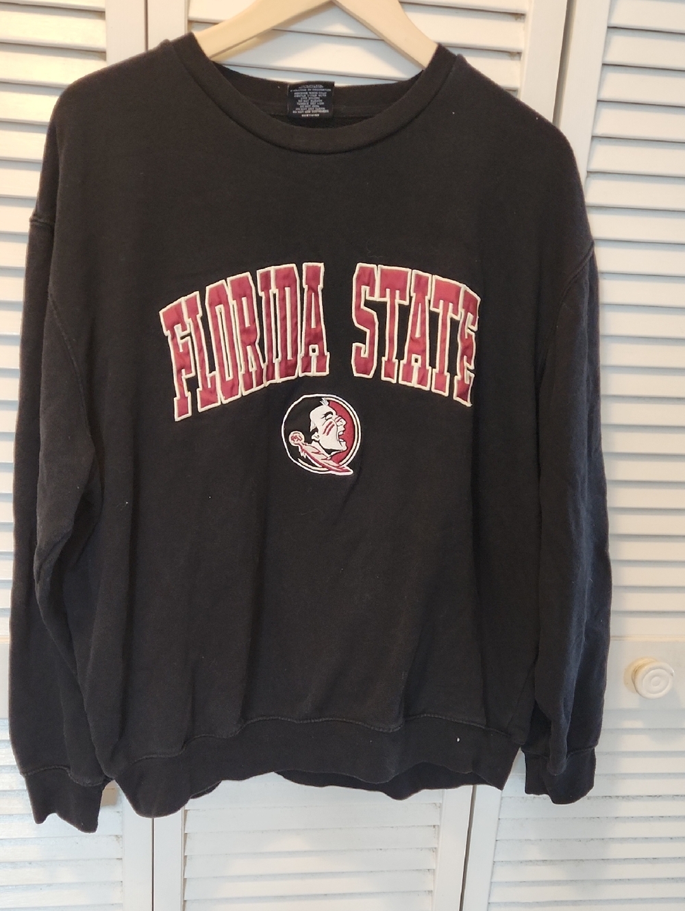 Colosseum Black Crewneck Sweatshirt with Garnet Florida State Applique